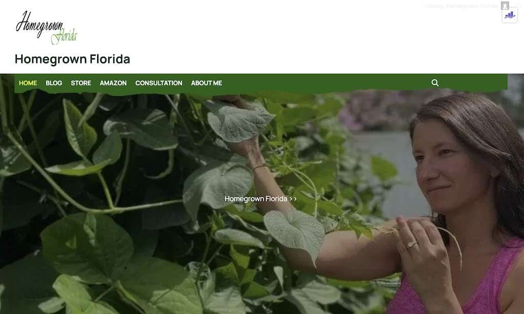 Woman tending to lush homegrown Florida garden with green plants.